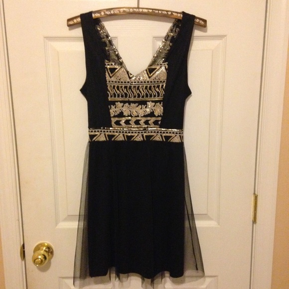 Fun, glamorous and cute black dress!