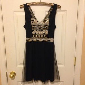 Fun, glamorous and cute black dress!
