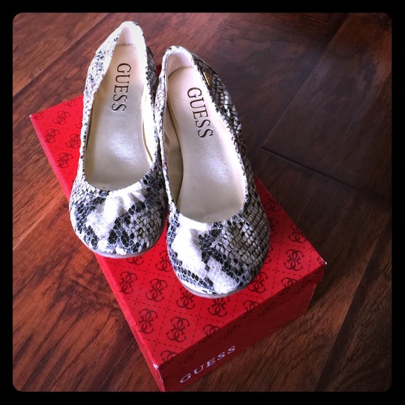 Guess low heel shoes.