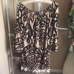 Very cute dress to wear with leggings or alone.