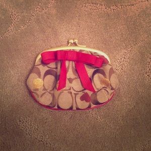 Coach gold and red change purse