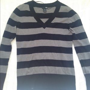 Lightweight striped v neck sweater.