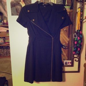 Mini black dress.