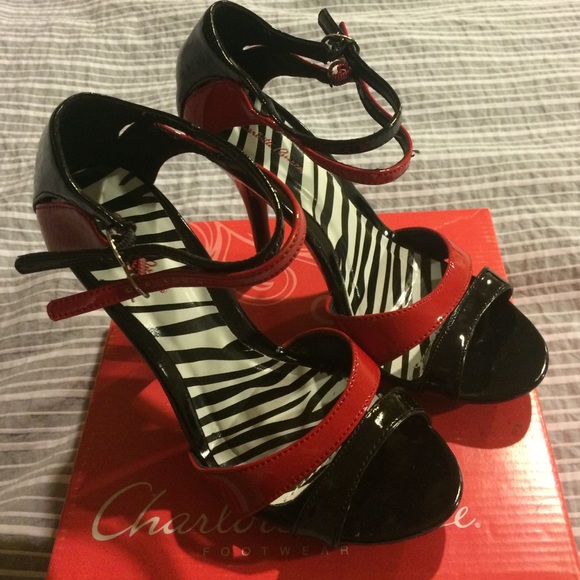 Beautiful patent black and red heals. Worn once.