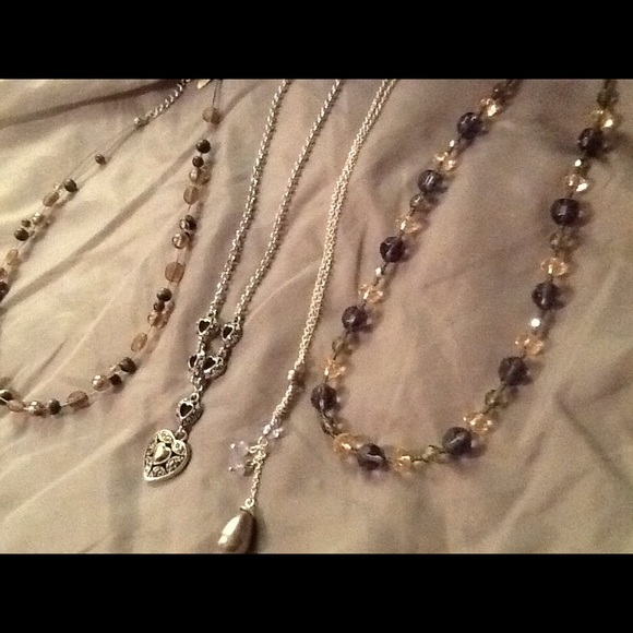 Four silver necklaces