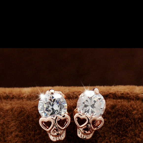 zdazzled Jewelry - Crystal Skull Earrings New