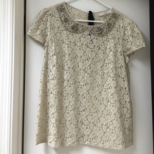 Lace top with jeweled neckline
