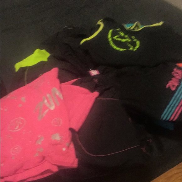 Zumba clothes - 5 pair of pants 3 tops and a towel
