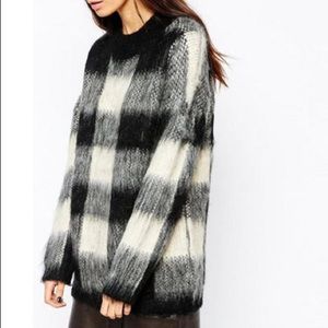 white black plaid crew neck sweater.