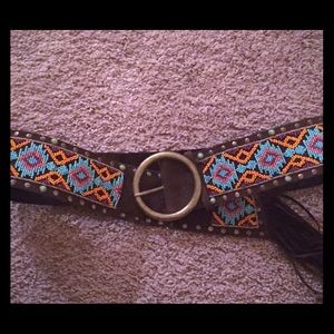 Tasha Polizzi beaded leather belt with fringe.