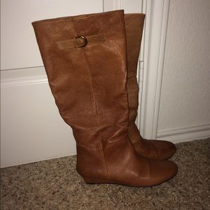 Size 10 women's tall riding boots.