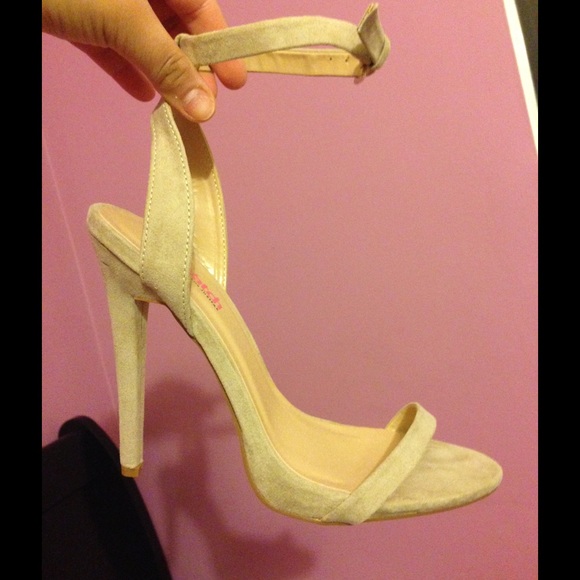 Nude suede heels.