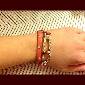 Pink cuff bracelet with rhinestones