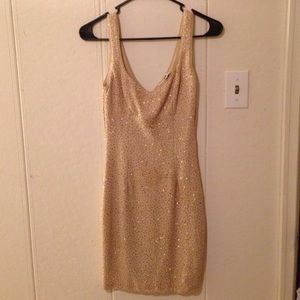 Gold sparkle dress.