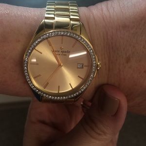 Yellow gold Kate Spade watch with date