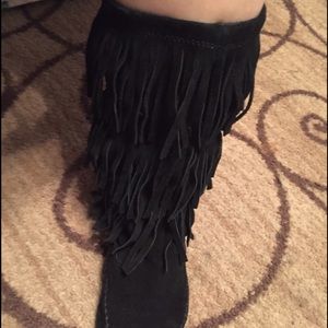 Black fringe moccasin boots
