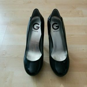 G By Guess black synthetic pumps