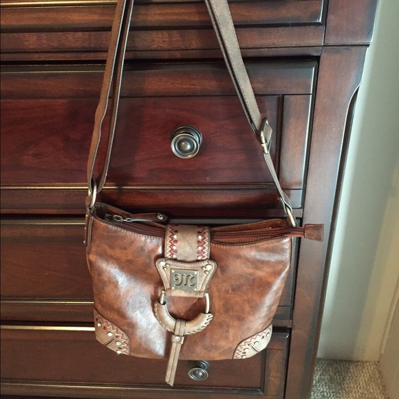 Authentic Miss Me leather bag from Buckle