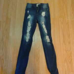 High waisted blue ripped jeans