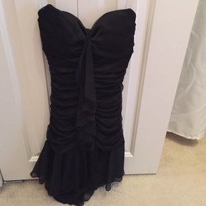 Strapless black mini dress