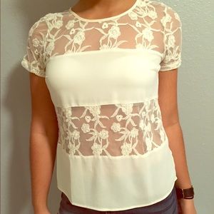 Cream lacy top.