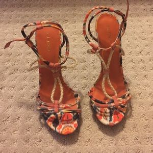 Orange with cream and blue accents sandal.