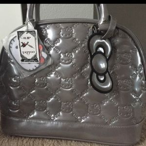 Lounge fly Hello Kitty purse