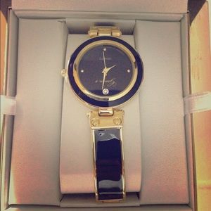 New black and golden gruen watch