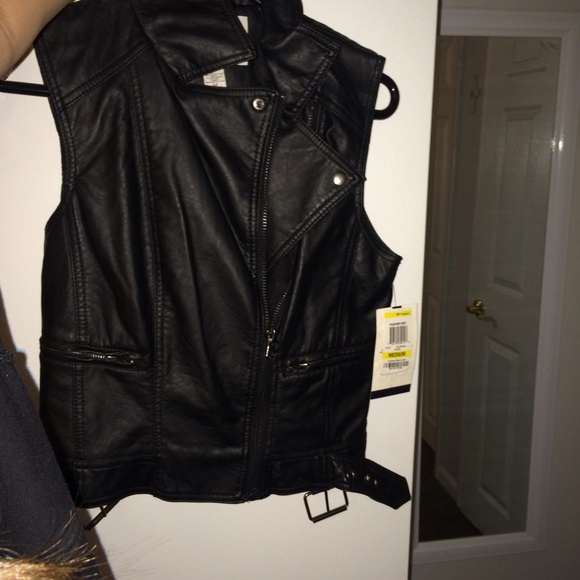 Leather Vest.