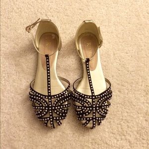 Black and gold studded strappy flats