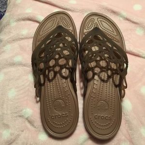 Crocs size nine flip flops. New