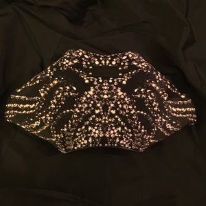 Authentic De Manta clutch.