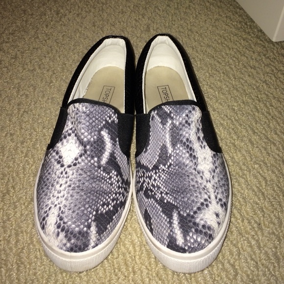 Snakeskin slip on sneakers