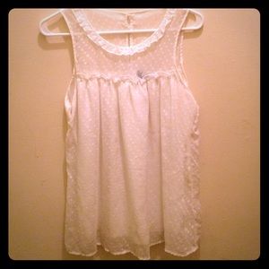 White sleeveless blouse