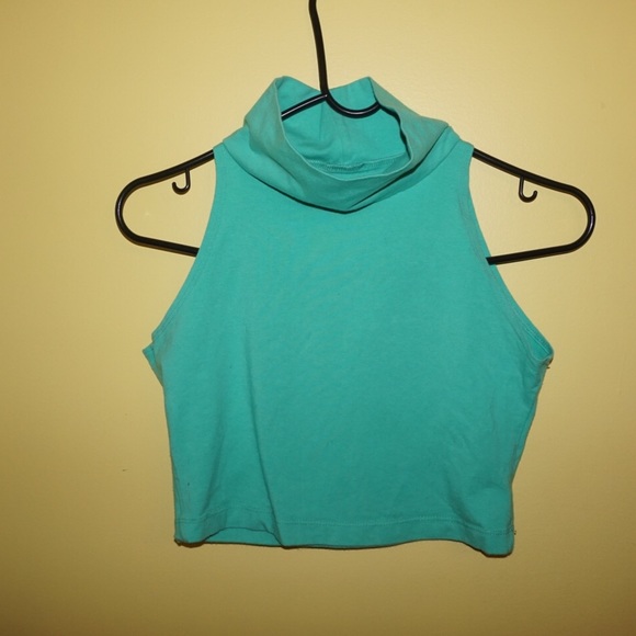 Turquoise turtleneck sleeveless crop top