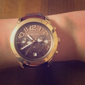 MK rose gold watch with brown leather band