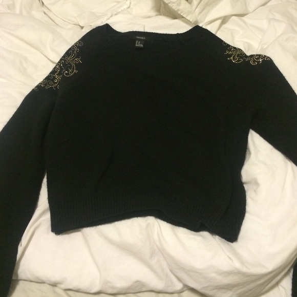 Cute black sweater with gold detail