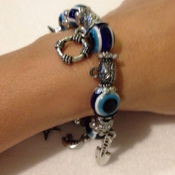 Silver tone plastic evil eye protection bracelet