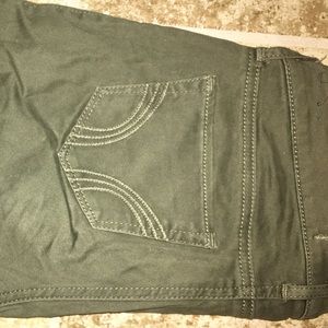 Olive green two tone skinny jeans.