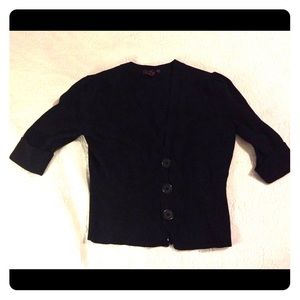 I am selling this black 3 button up vest!