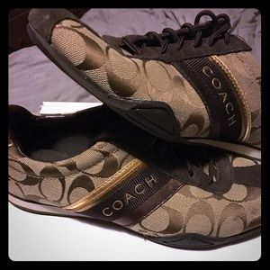 Coach sneaks. Worn once. Comes with box
