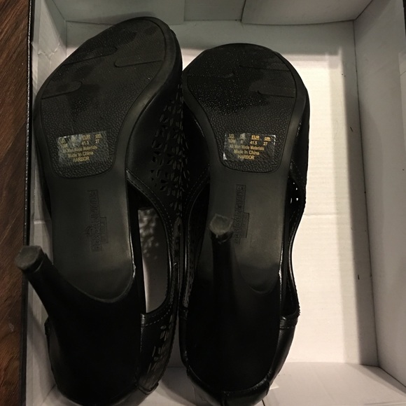 Black zippered high-heel booties. - Picture 2 of 4