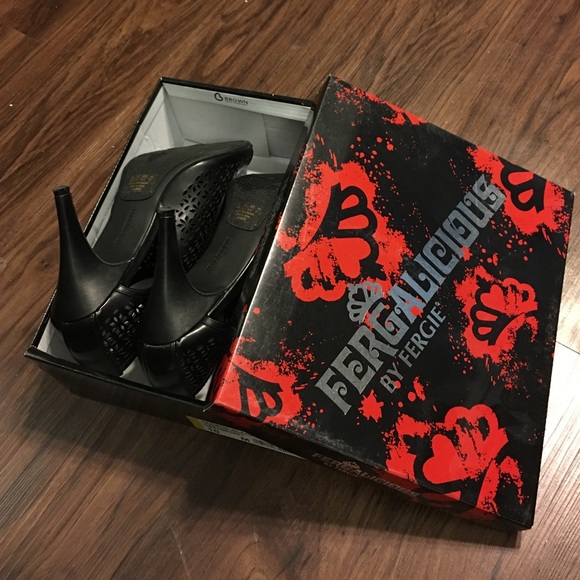 Black zippered high-heel booties. - Picture 3 of 4