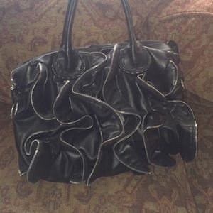 Steven Madden black tote with zipper design