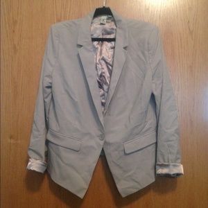 Tan blazer.