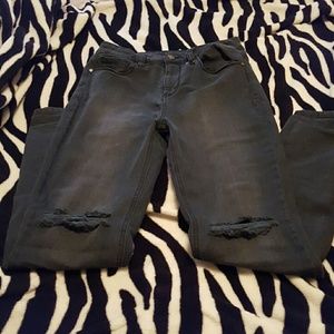 High-waisted ripped skinny jeans