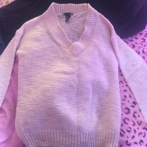 Tan/Beige V-neck sweater.