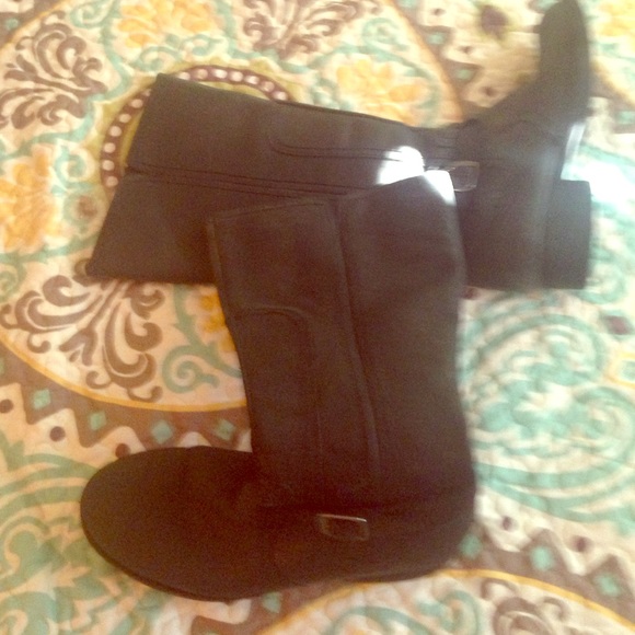 Old black leather boots.