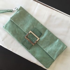 Never used Bebe clutch. Soft jade green leather