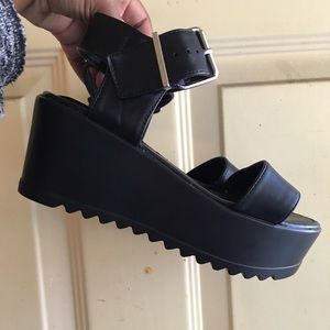 Black platform sandals.